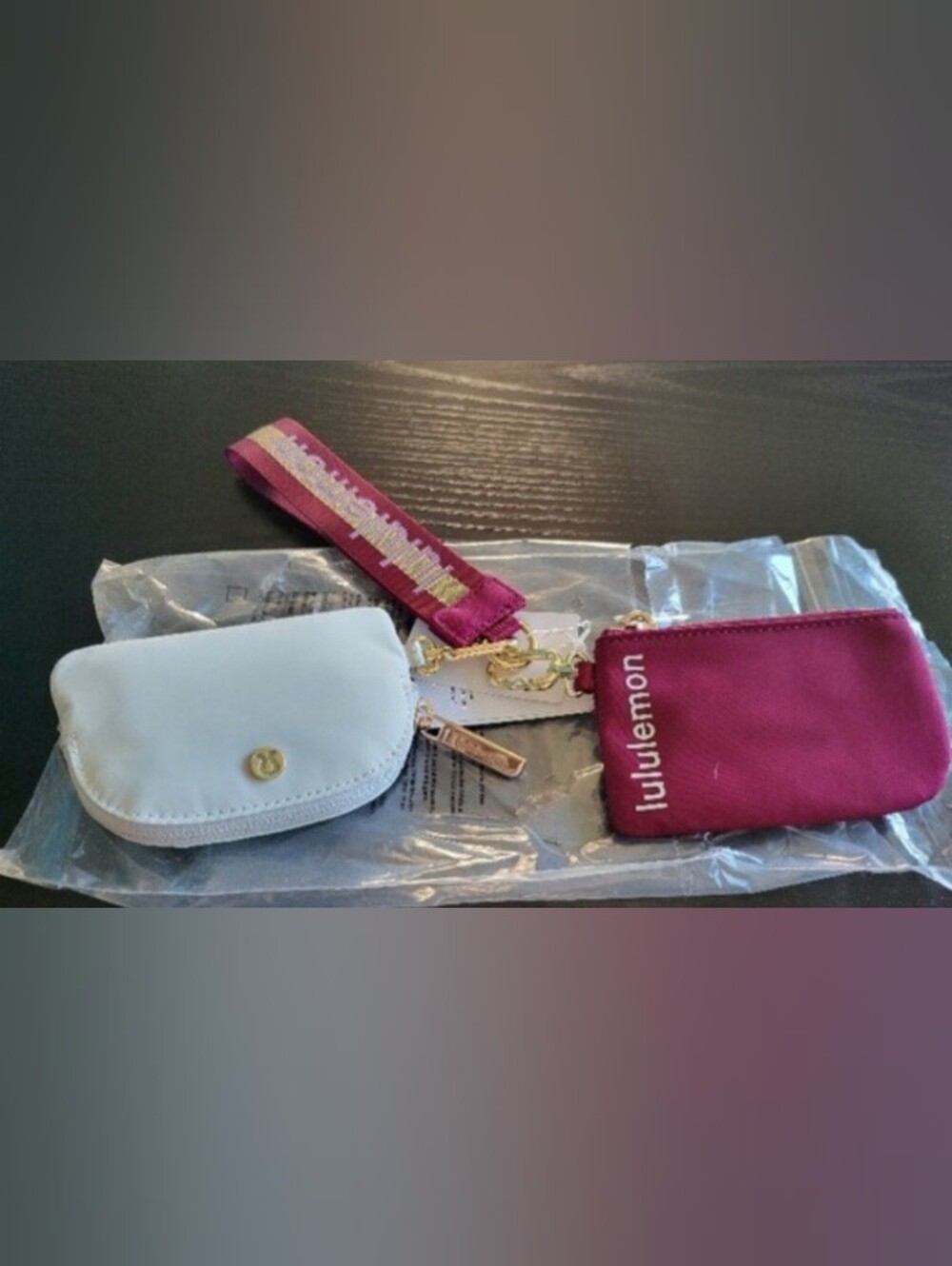 lululemon athletica
Lululemon DualPouch Wristlet *Wordmark Deep Luxe/ Gold/Bone